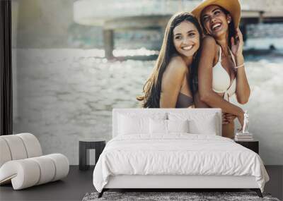 Beautiful girls enjoying summer and sea water Wall mural