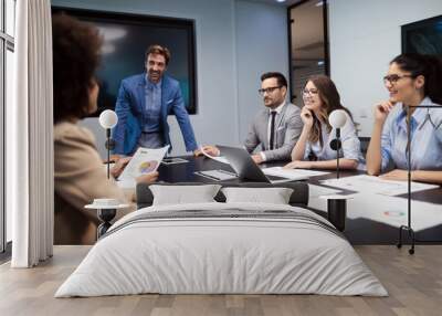 business colleagues having meeting in conference room in office Wall mural