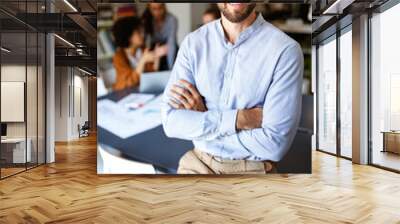 Business partners sharing ideas and planning work at meeting in office Wall mural