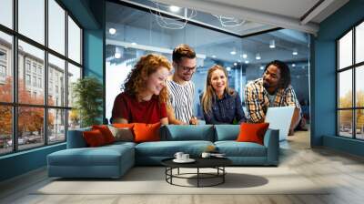 Business people having fun and chatting at workplace office Wall mural