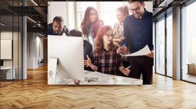 Company employees working in office Wall mural