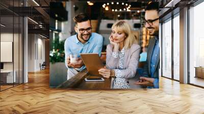 Coworker business colleagues working together in office Wall mural