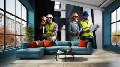 Engineer, contractor, architect teamwork. Construction people talking and planning work, blueprint Wall mural