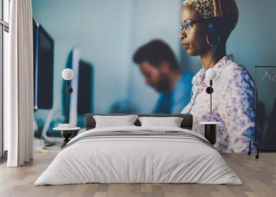 Female software developer working for IT company Wall mural