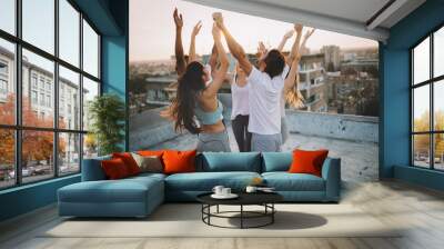 Fitness, sport, friendship and healthy lifestyle concept - group of happy sporty friends Wall mural