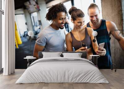 Friends making selfie in the gym after workout Wall mural