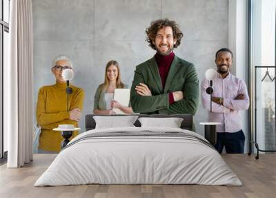 Group of business people and software developers working as a team in office Wall mural