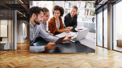 Group of business people collaborating on project in office Wall mural