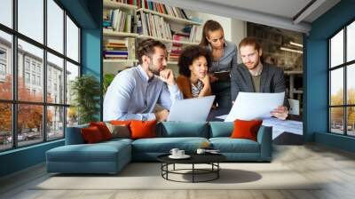 Group of business people collaborating on project in office Wall mural