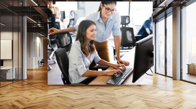 Group of business people working together, brainstorming in office Wall mural