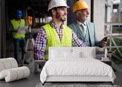 group of construction engineer working in construction site Wall mural