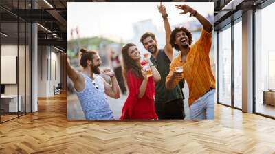 Group of friends having fun, traveling, smiling together outdoors Wall mural