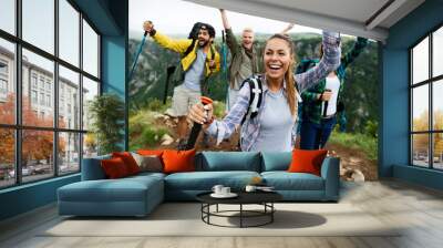 Group of happy friends enjoying outdoor activity together Wall mural