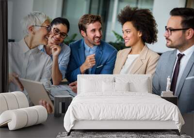 Group of multiethnic business people working at busy modern office Wall mural