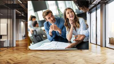 Group of successful multiethnic business people celebrating a good job in the office Wall mural