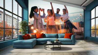 Group of young happy friends having party and fun Wall mural