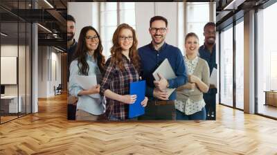 Group picture of young successful team of designers Wall mural