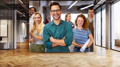 Happy business people celebrating success at company Wall mural