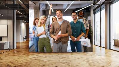 Happy business people celebrating success at company Wall mural