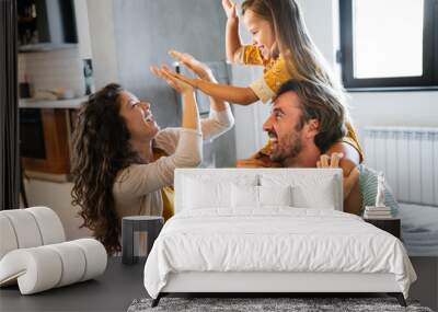 Happy family having fun time at home together. People love, happiness concept. Wall mural