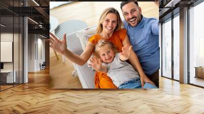 Happy family having fun time at home. Parents children love happiness concept. Wall mural