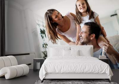 Happy family having fun time at home Wall mural