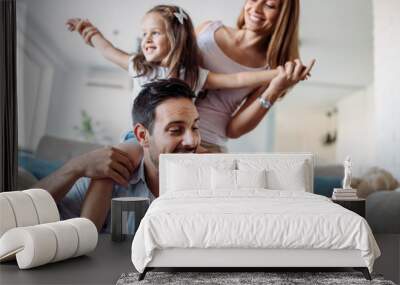 Happy family having fun time at home Wall mural