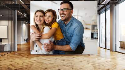 Happy family having fun time at home Wall mural