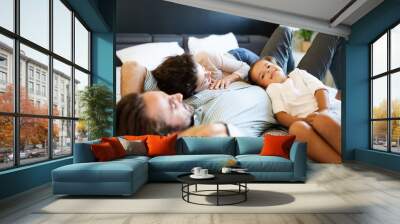 Happy family having fun time at home Wall mural