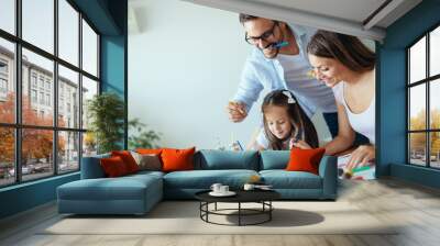 Happy family having fun time at home Wall mural