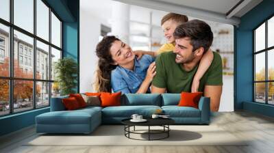 Happy family having fun time at home Wall mural