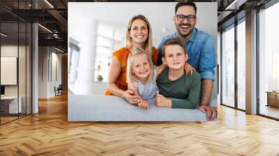 Happy family having fun times at home Wall mural