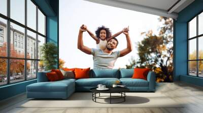 happy father and child spending time outdoors Wall mural