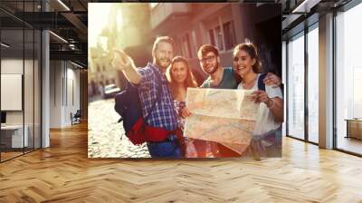 Happy tourists exploring city Wall mural