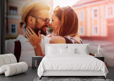 Holidays, vacation, love and friendship concept. Smiling couple having fun Wall mural