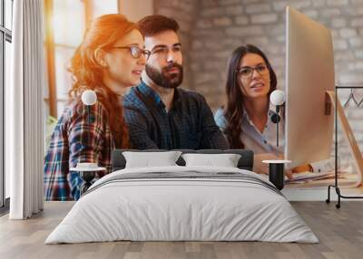 Picture of architects working together in office Wall mural