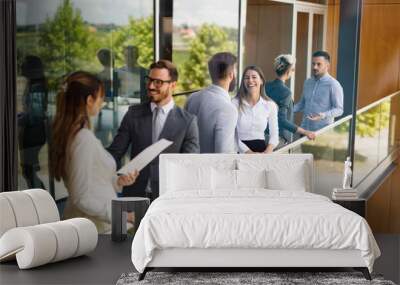 Picture of business people discussing in their company Wall mural