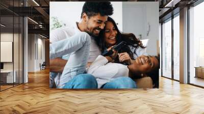 Picture of happy family having fun time together Wall mural