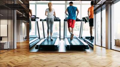 Picture of people running on treadmill in gym Wall mural