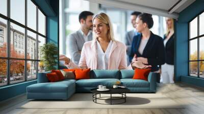 Picture of sales agents working together in office Wall mural