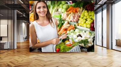 Picture of woman at marketplace buying vegetables Wall mural