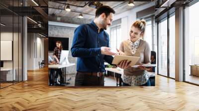 Portrait of architects having discussion in office Wall mural