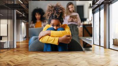 Portrait of black bored sad teen at home. Nobody to play with. Mental health issues during coronavirus Wall mural