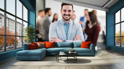 Portrait of business team posing in office Wall mural