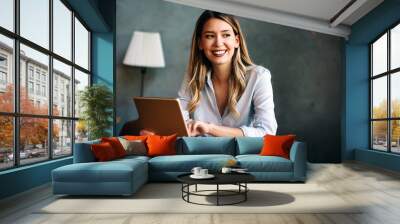 Portrait of happy beautiful successful business woman, manager working Wall mural