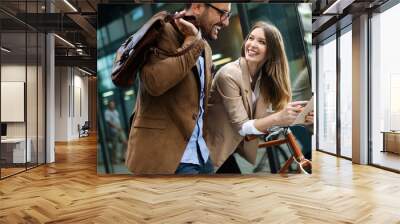 Portrait of happy business friends enjoying the break from meeting Wall mural