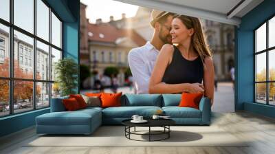 Portrait of happy couple having date and fun on vacation. People travel happiness concept. Wall mural