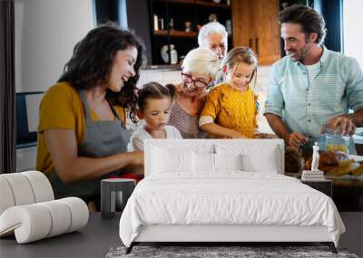 Portrait of happy family in kitchen at home Wall mural