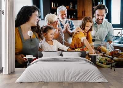 Portrait of happy family in kitchen at home Wall mural