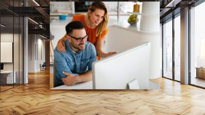 Portrait of success business people working together in home office. Couple teamwork startup concept Wall mural